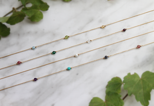 gold birthstone necklaces