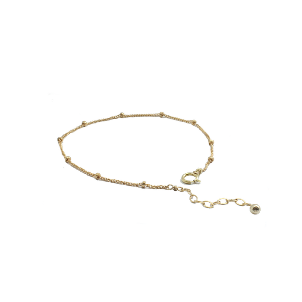 gold satellite chain anklet layered with the gold coined anklet