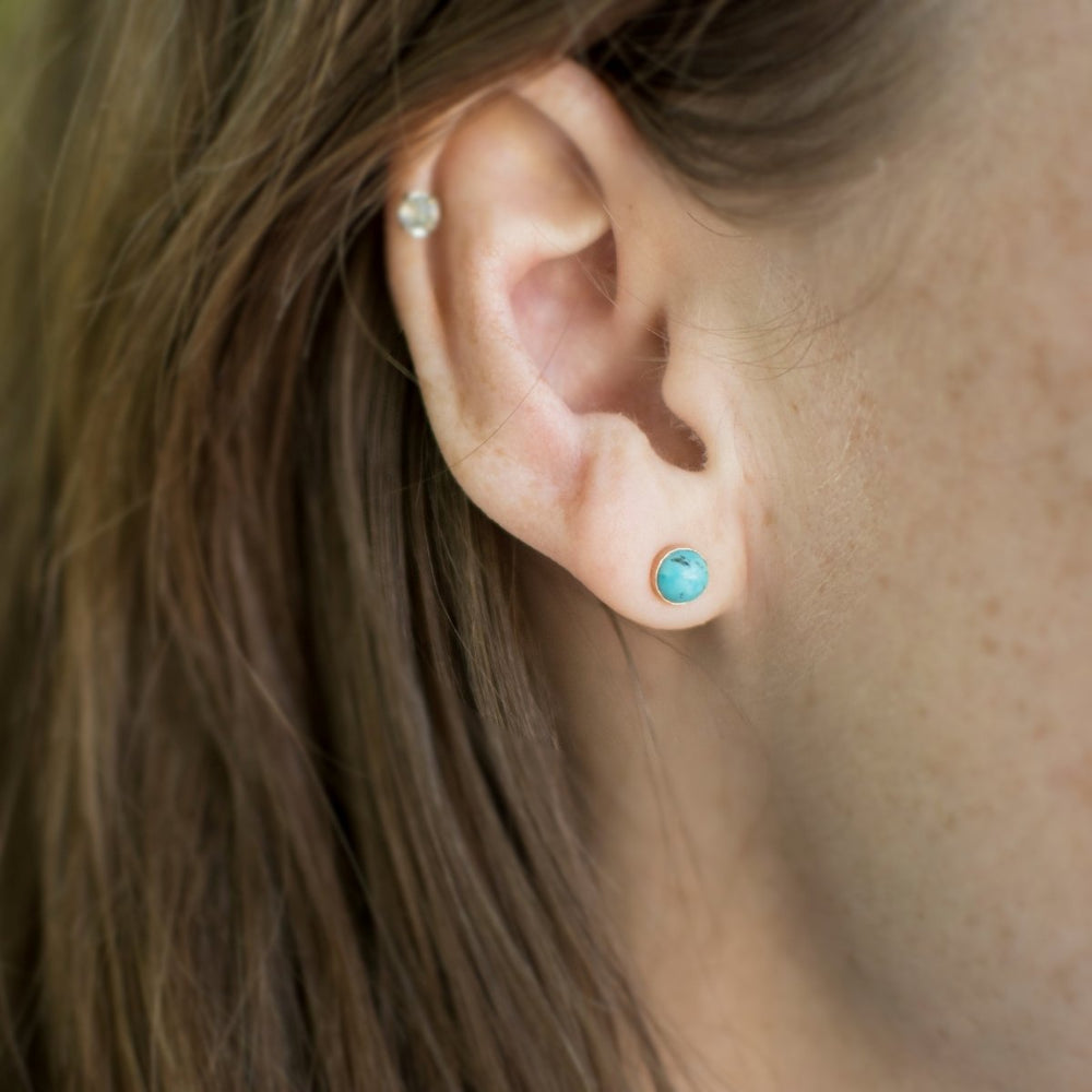 model wearing turquoise stud